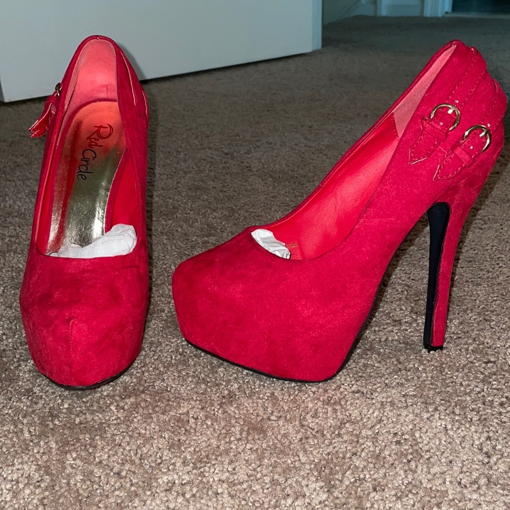 Red heel with gold buckle heels